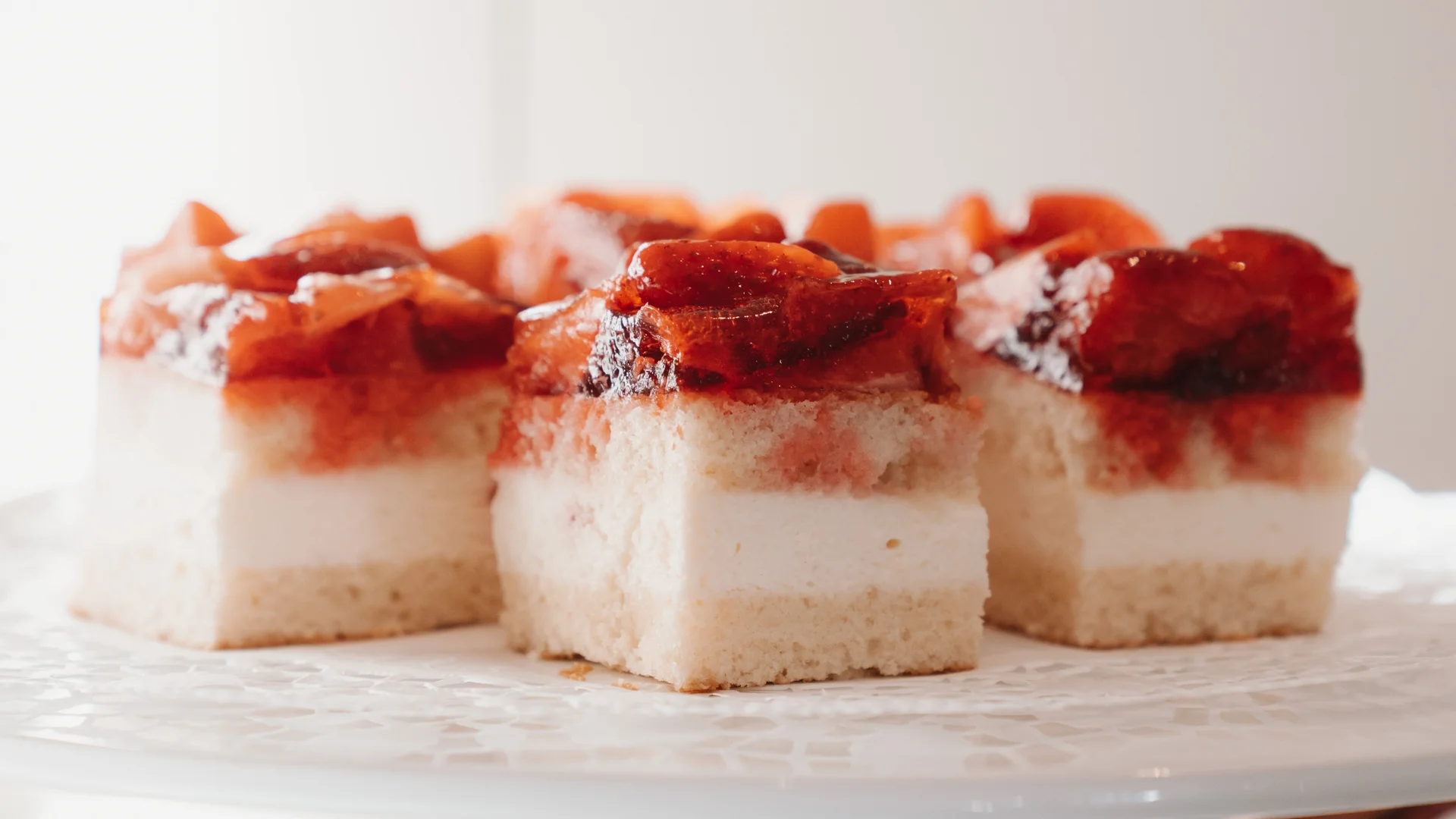 Picture gallery | Hotel Panorama in Lech am Arlberg Slices of strawberry cake with cream filling on a white cake stand